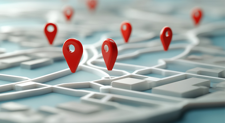 3D-Stadtplan mit mehreren roten Standortmarkierungen